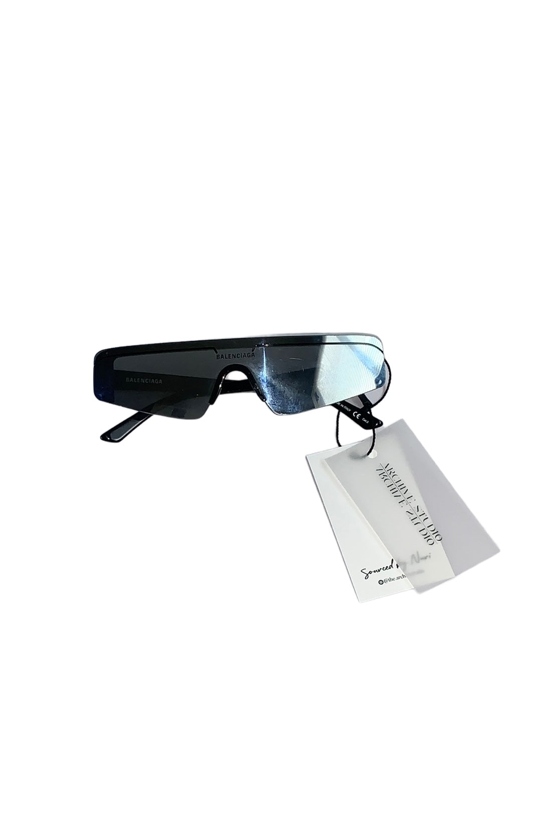 Balenciaga reflective silver sunglasses.